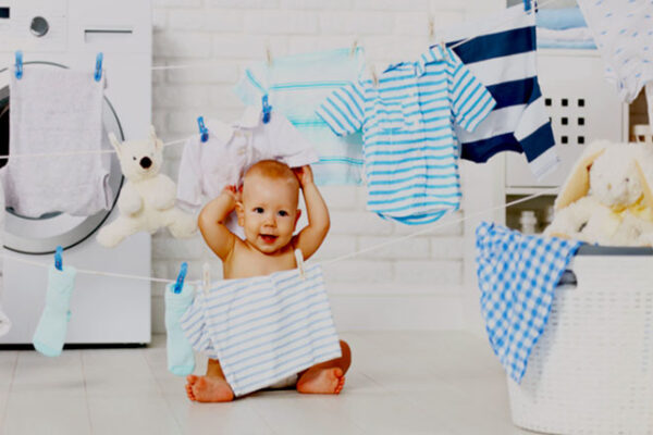 نحوه شستن لباس نوزاد با ماشین لباسشویی